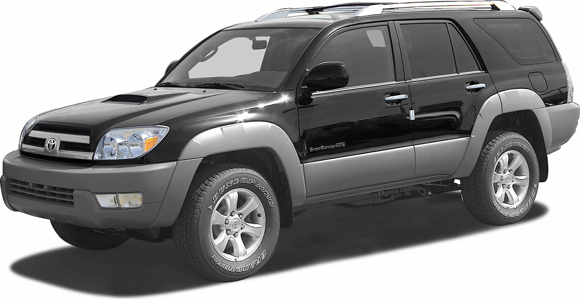 Front-side view of black SUV with rugged fender flares and roof rails