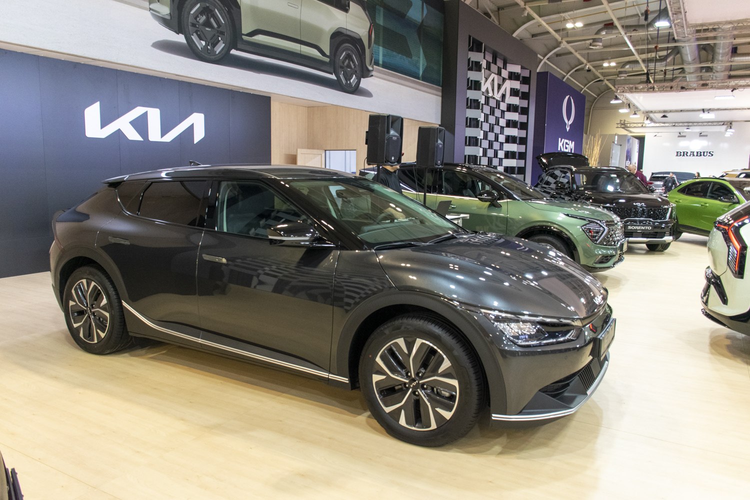 Sleek electric SUV front side view with alloy wheels