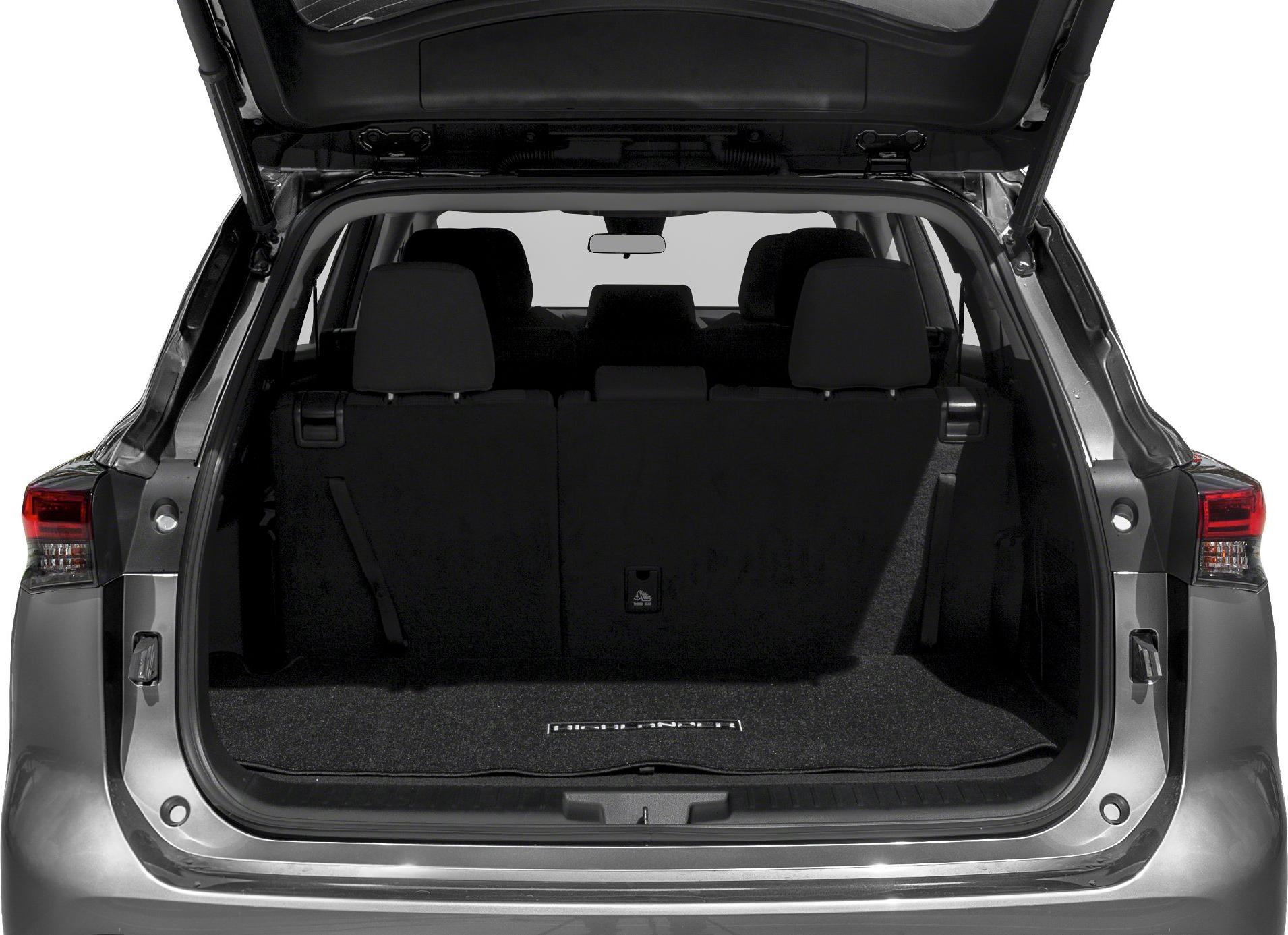 Open rear cargo space with rear seats in upright position and open hatch