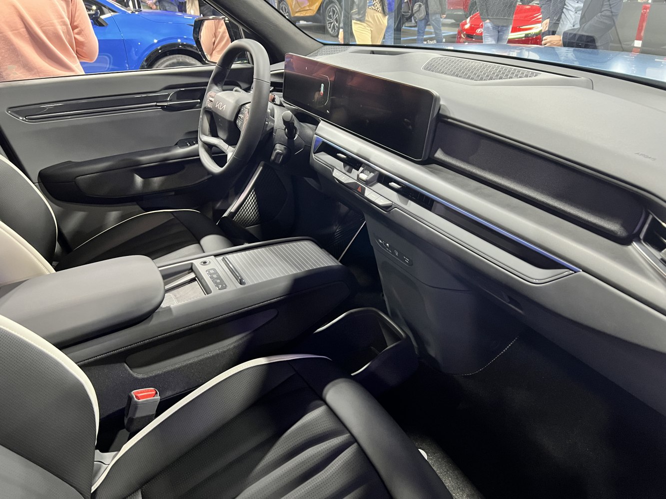 Modern electric SUV interior with widescreen digital dashboard and sleek console