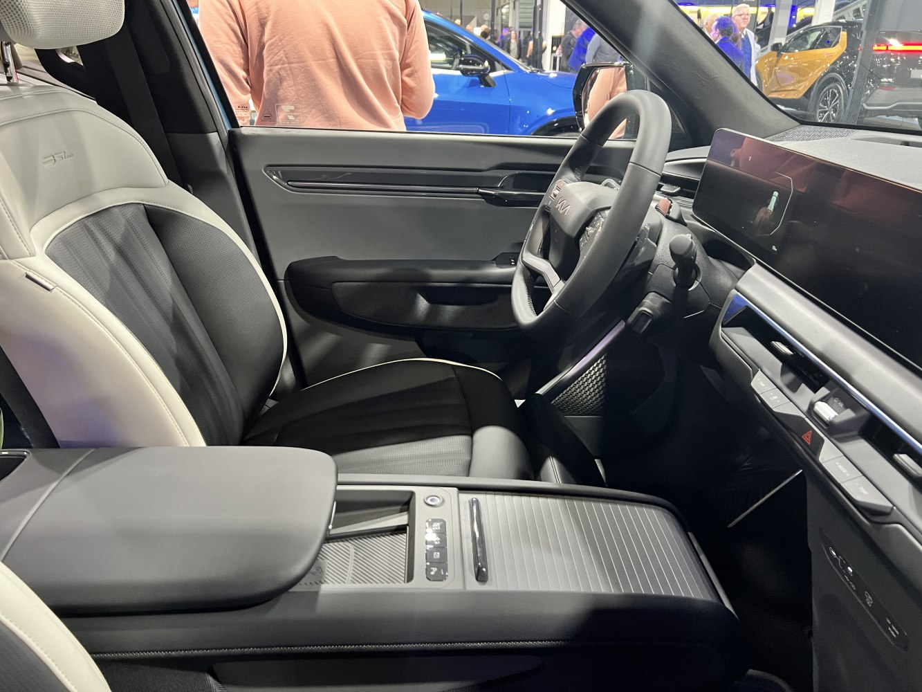 Modern steering wheel, digital dashboard, luxury front seat design