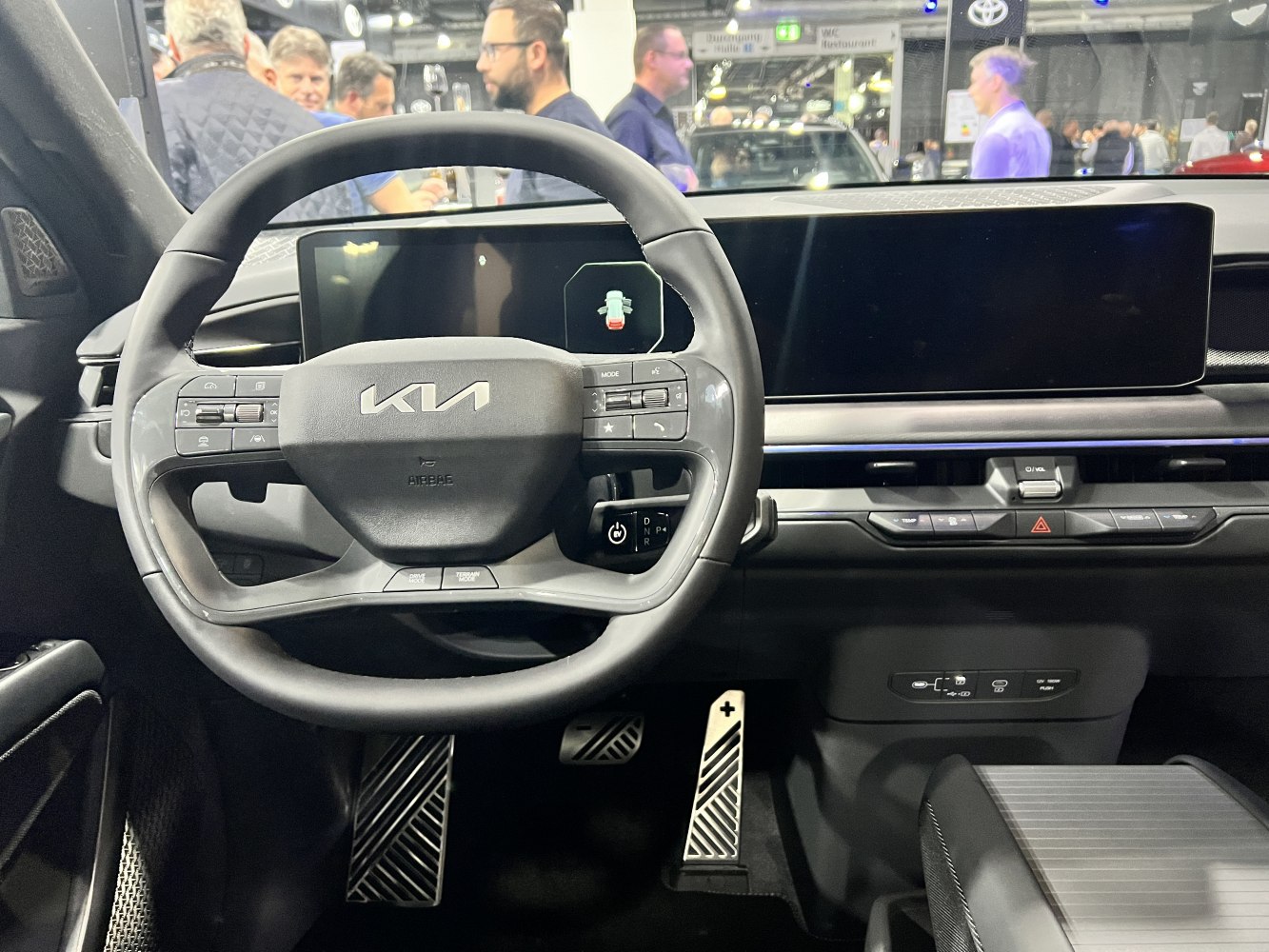 Modern steering wheel and digital dashboard with touchscreen display