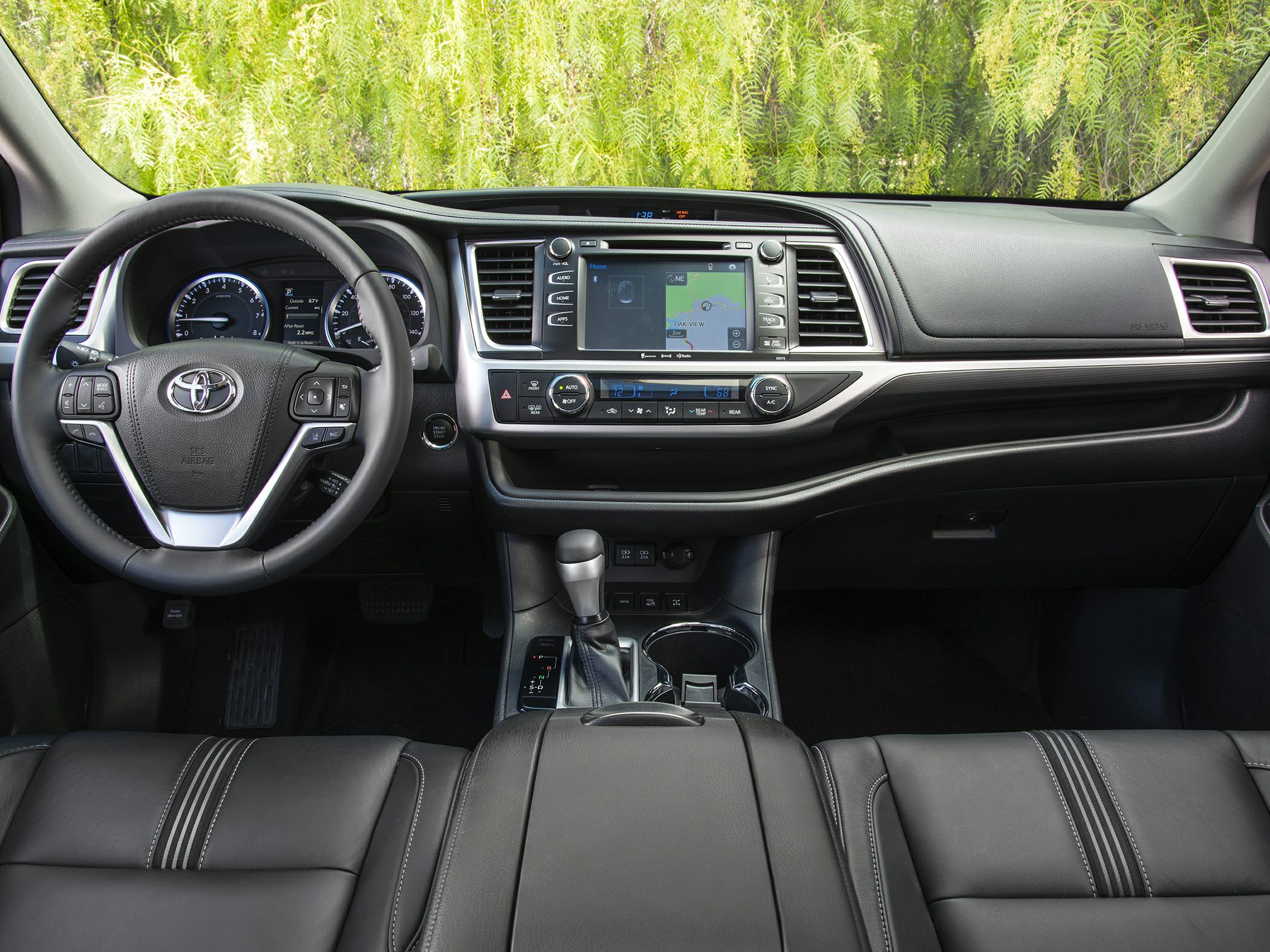 Interior dashboard and center console with touchscreen and steering wheel