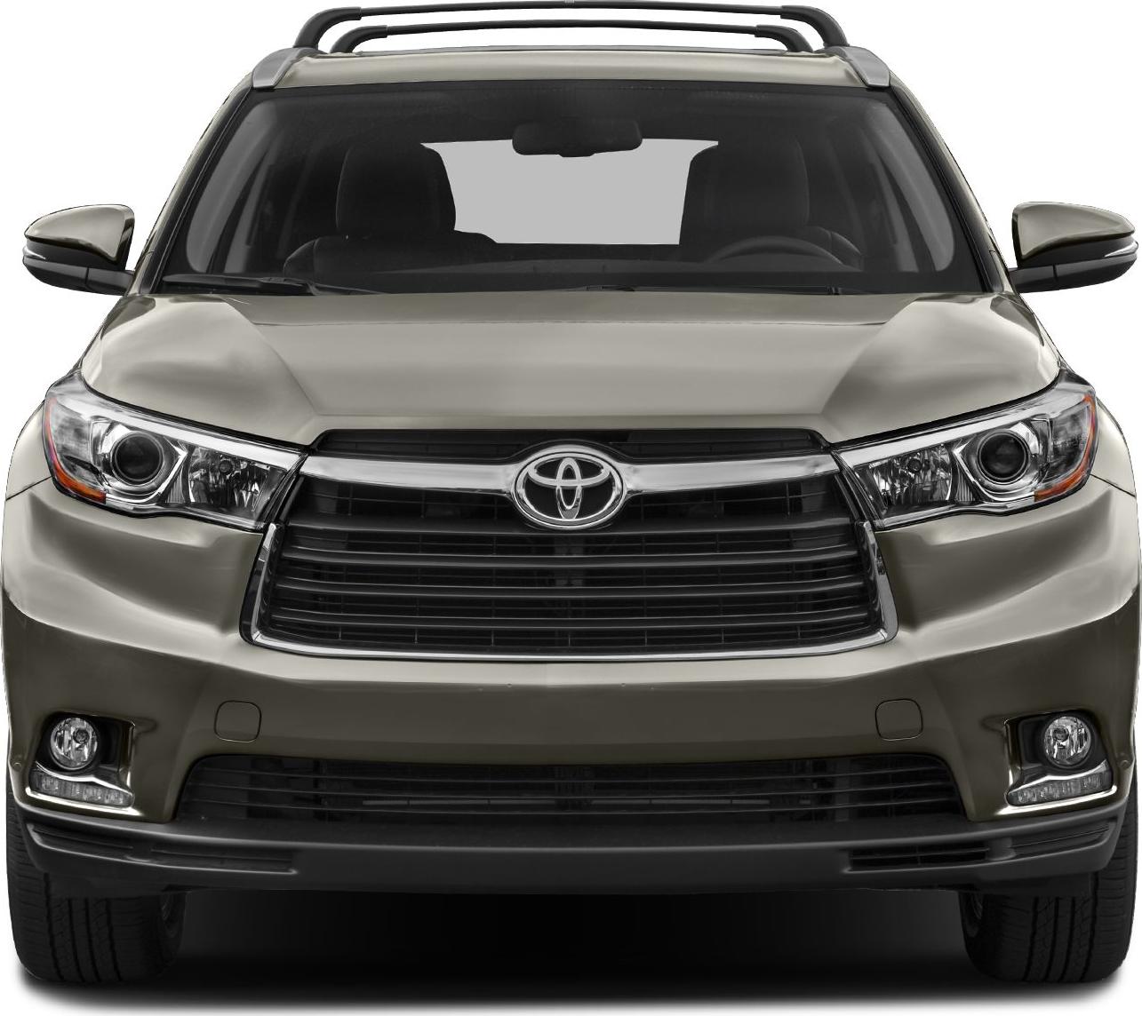 Close front view of SUV with grille, headlights, fog lights, and roof rails