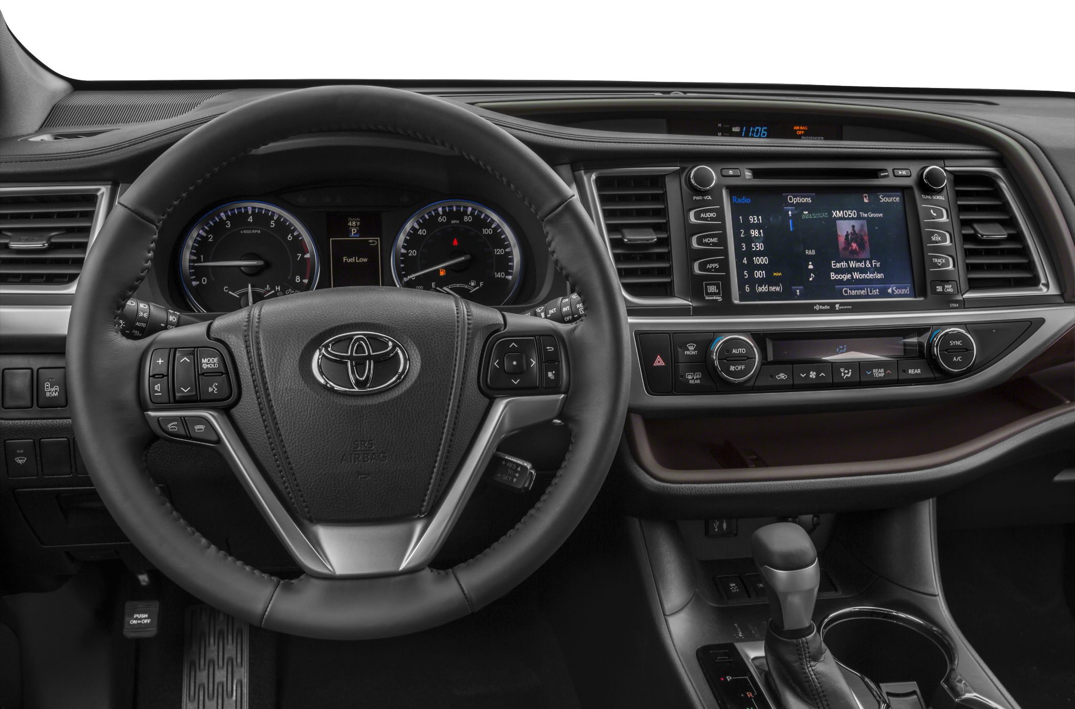 Steering wheel, dashboard, and infotainment system in car interior