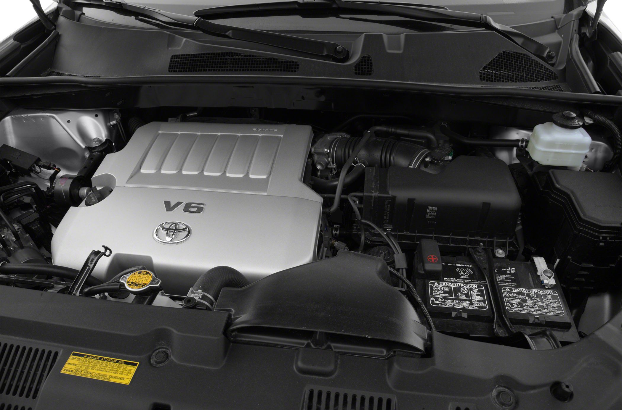 V6 engine bay with engine cover and battery components