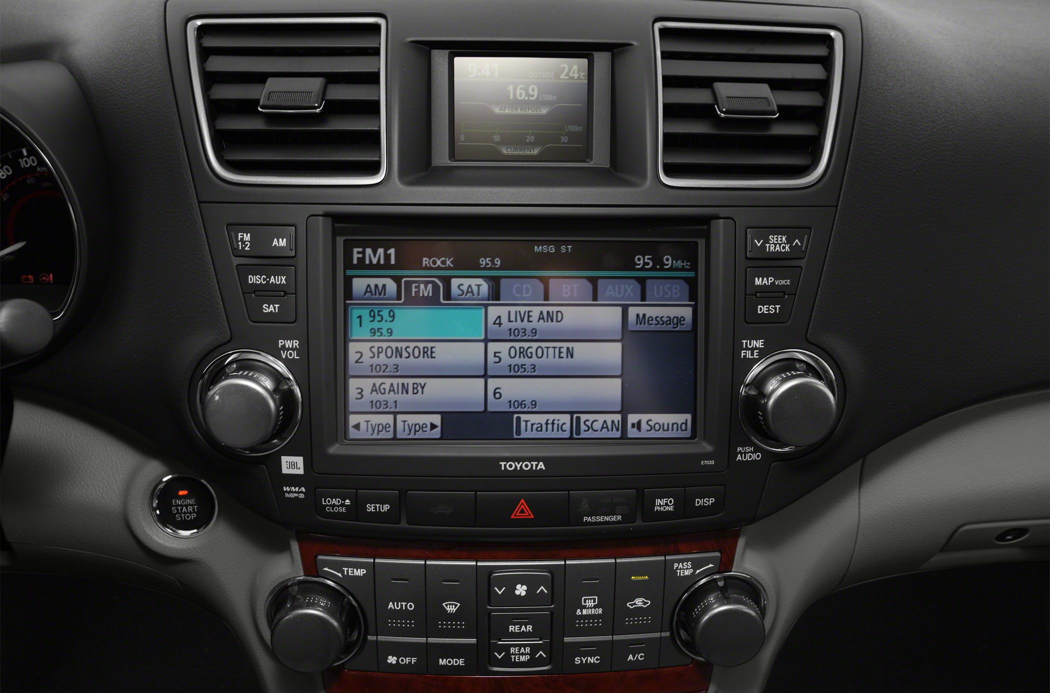 Center console with digital infotainment screen and climate control buttons