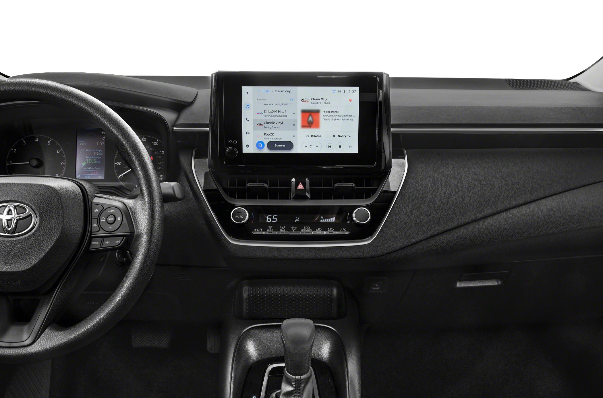 Interior dashboard with touchscreen display and steering wheel controls