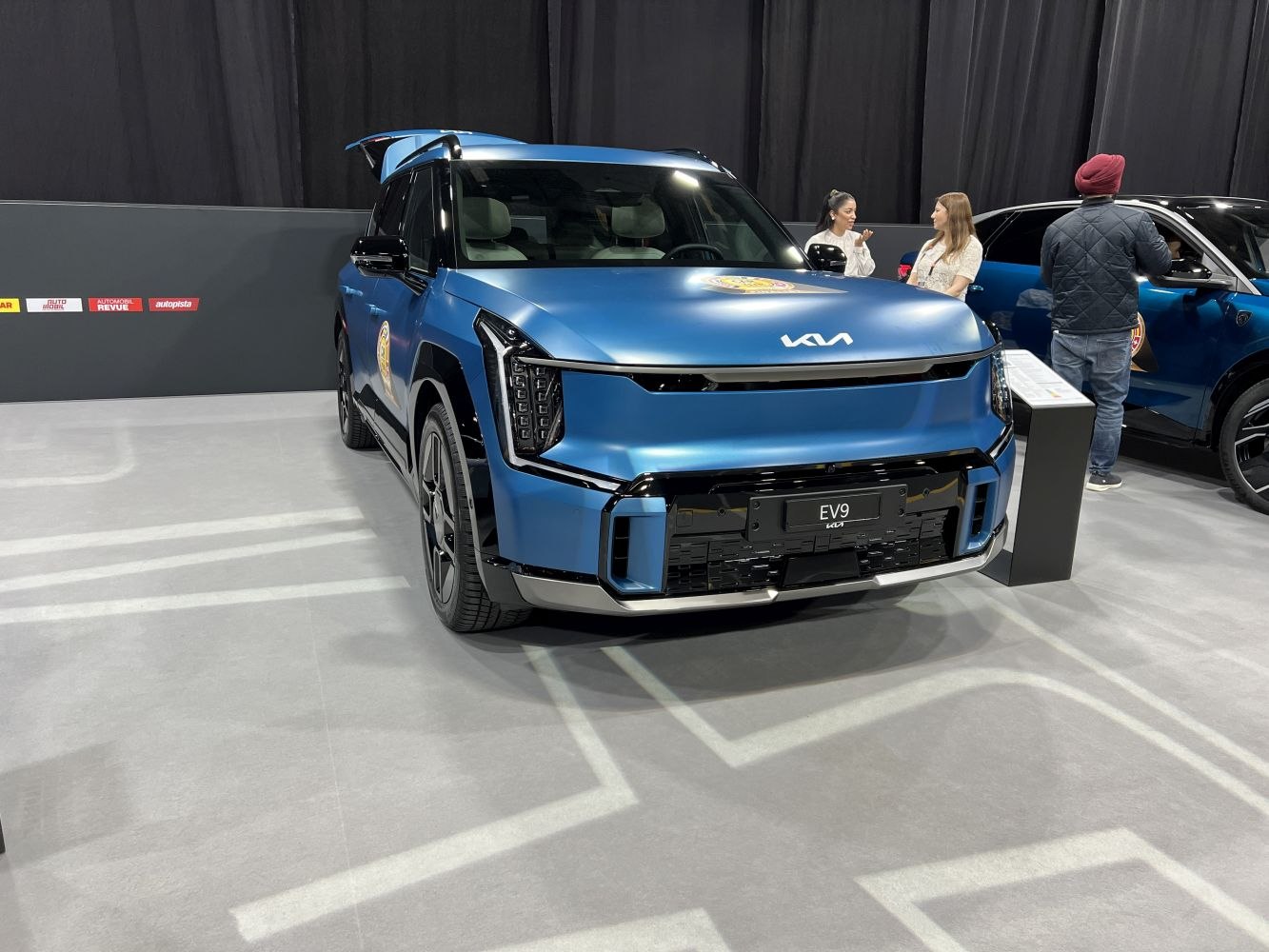 Front view of electric SUV with LED headlights and aerodynamic styling