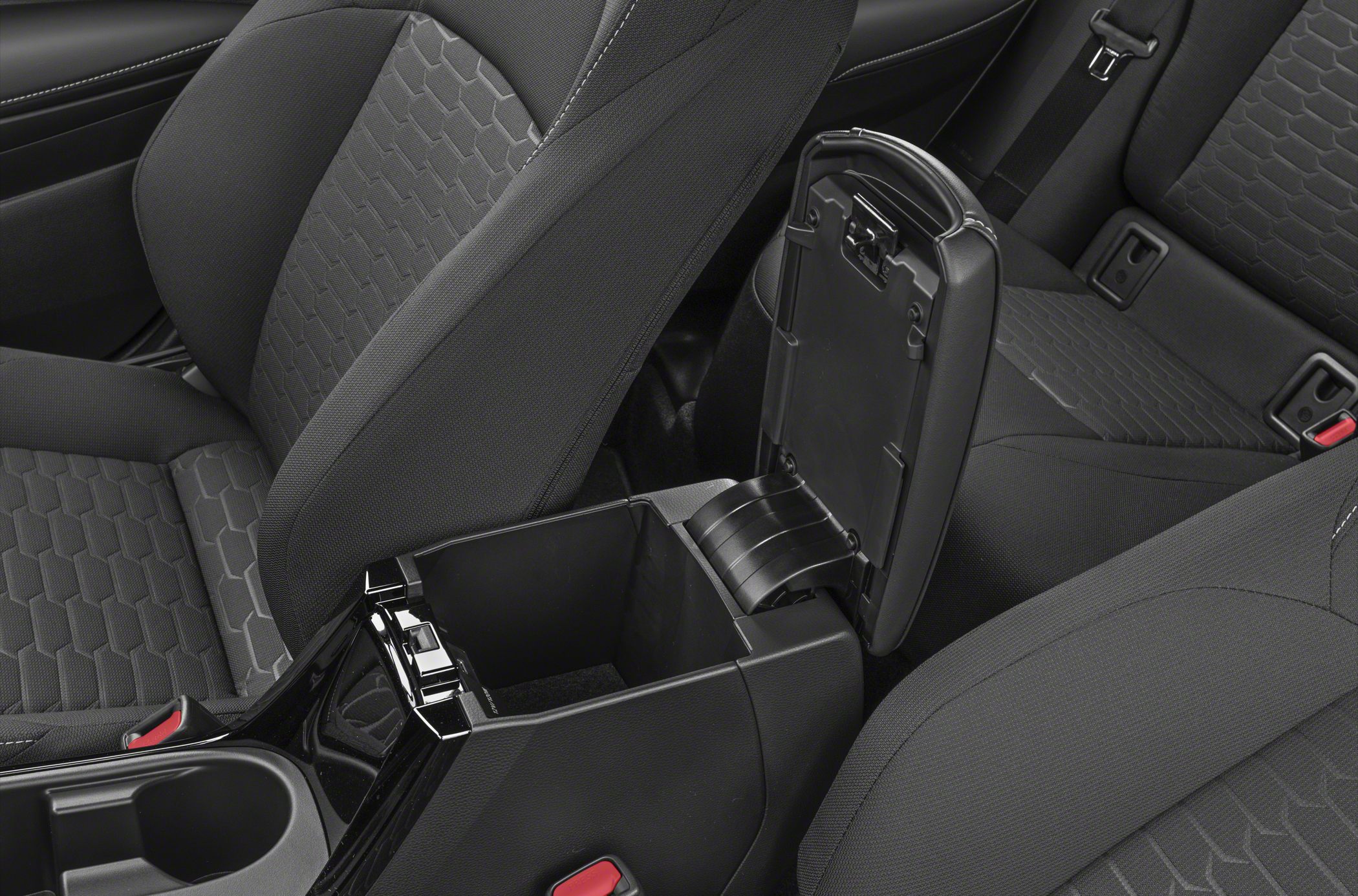 Spacious center console with textured upholstery seats