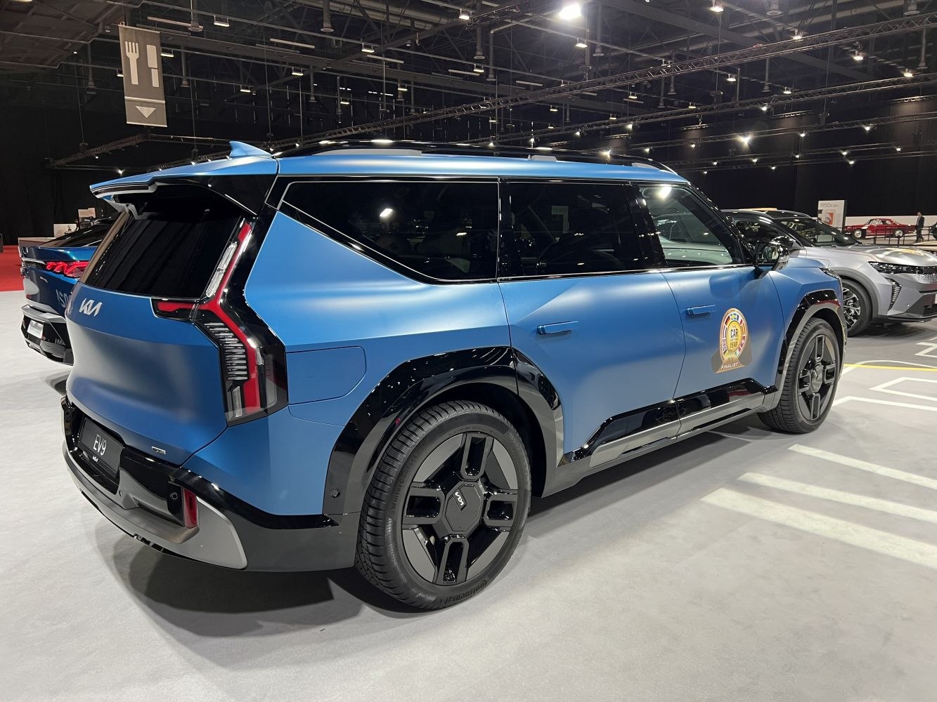 Electric SUV rear side with angular body and futuristic wheels