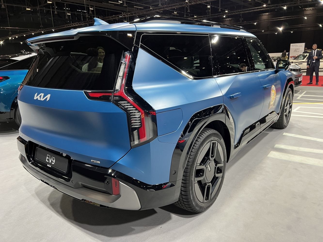 Rear and side view of electric SUV with distinctive taillights and modern wheels