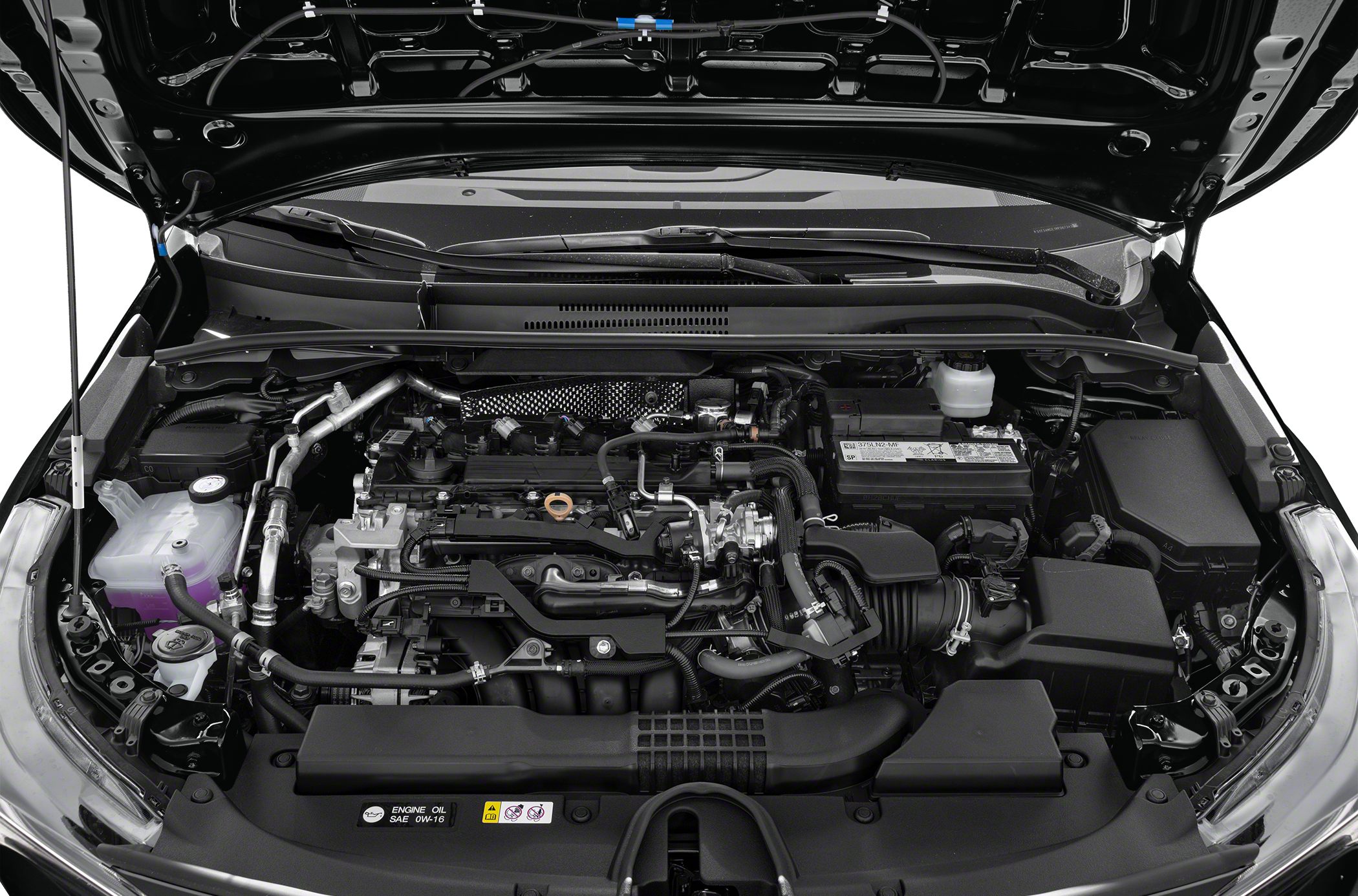 Open engine compartment showing engine and components.