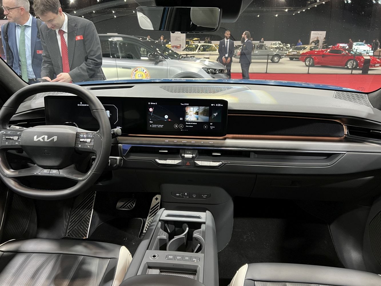 Digital dashboard and steering wheel in modern electric SUV interior