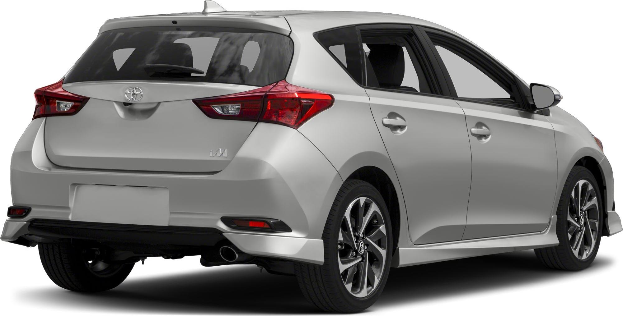 Rear side view of hatchback with alloy wheels and rear spoiler