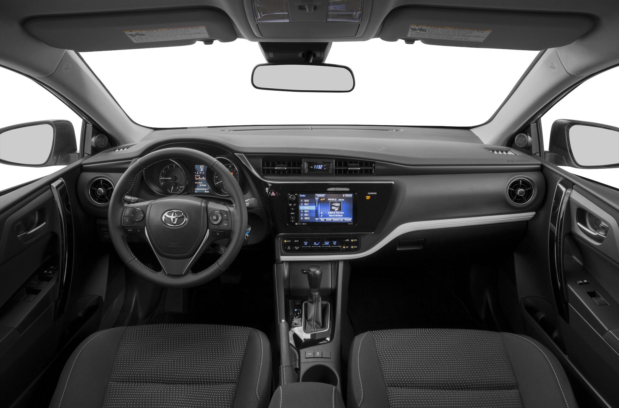 Modern car interior with dashboard, steering wheel, and infotainment system