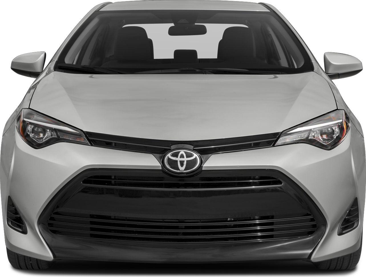 Front view with sleek headlights and prominent grille