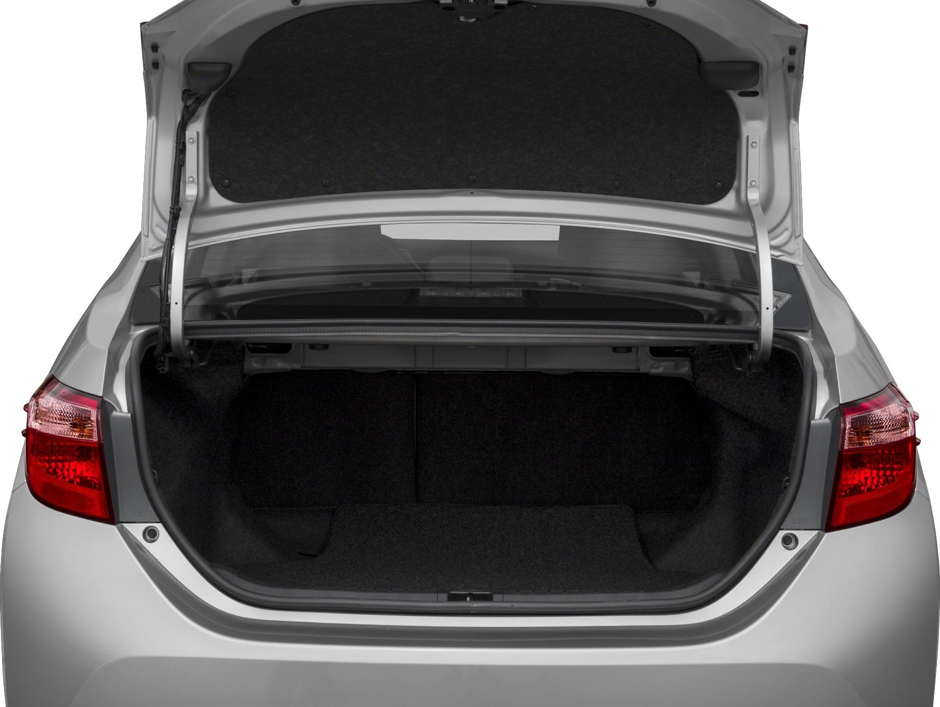 Rear trunk cargo space with open hatch and taillights
