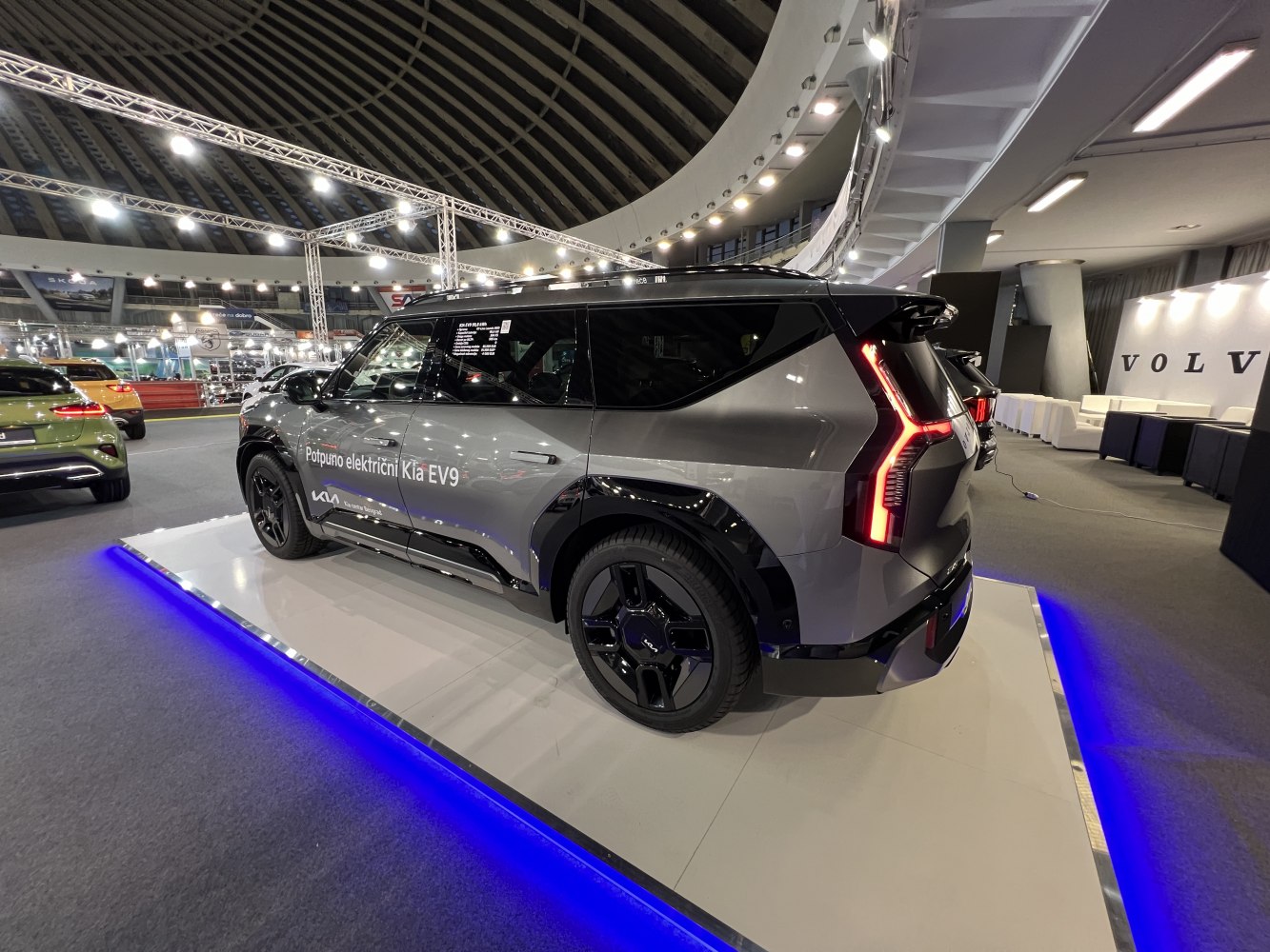 Rear and side view of electric SUV with vertical LED tail lights and black accents