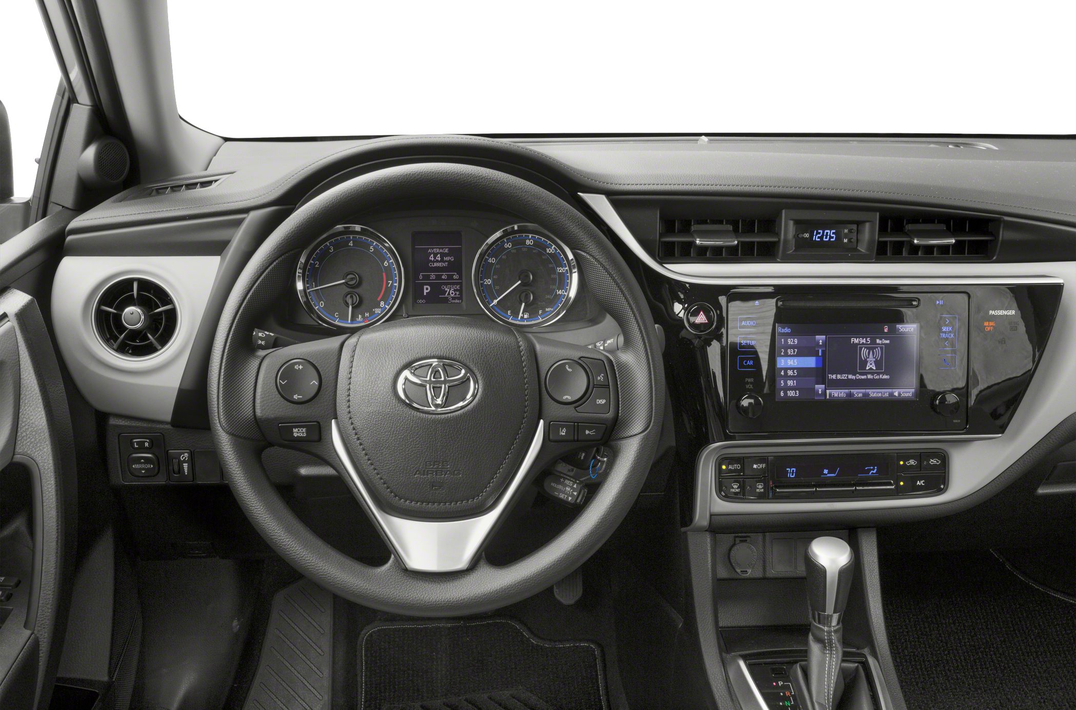 Dashboard, steering wheel, infotainment screen, climate control panels