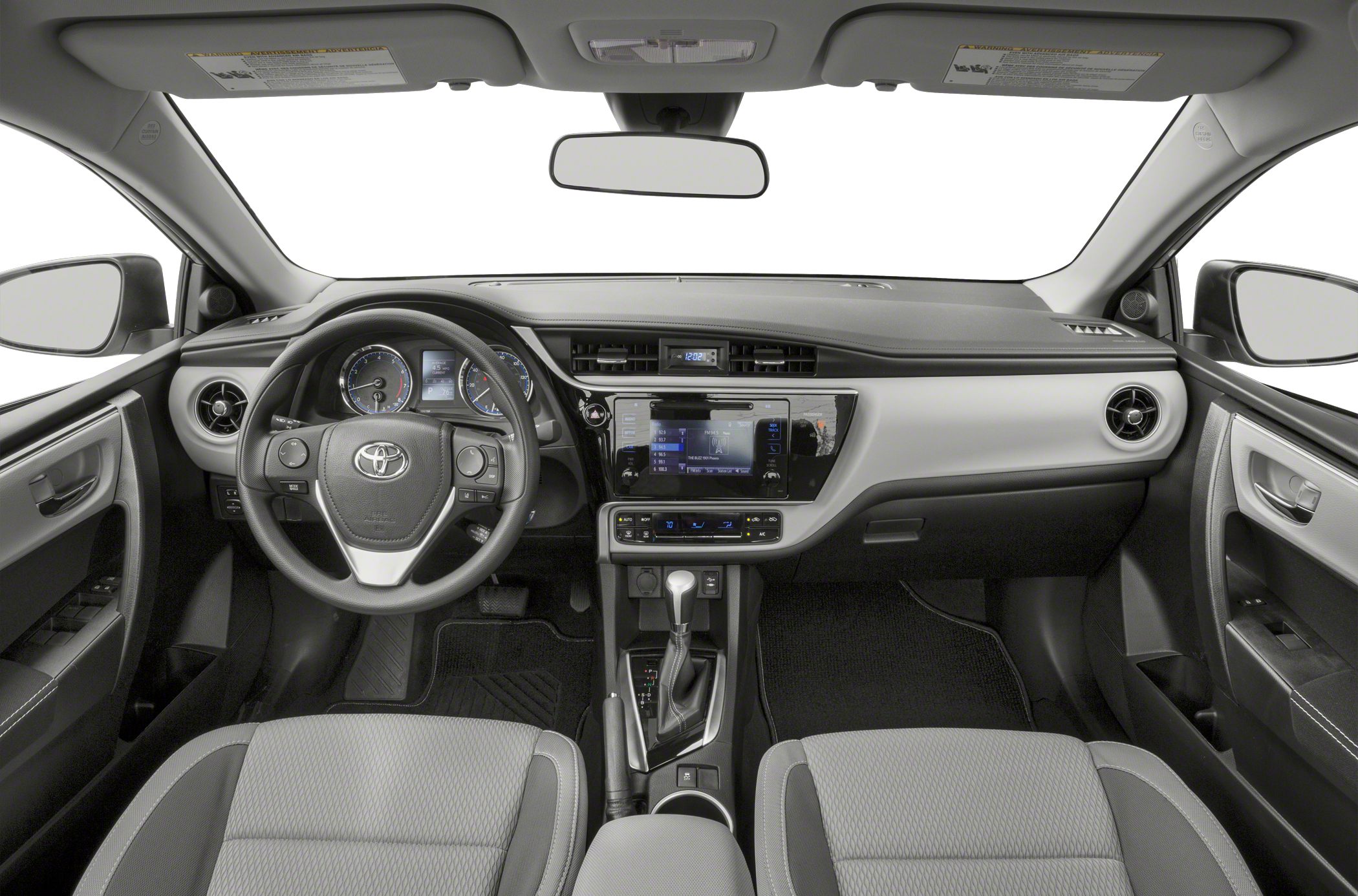 Dashboard, steering wheel, touchscreen, and center console of a car interior