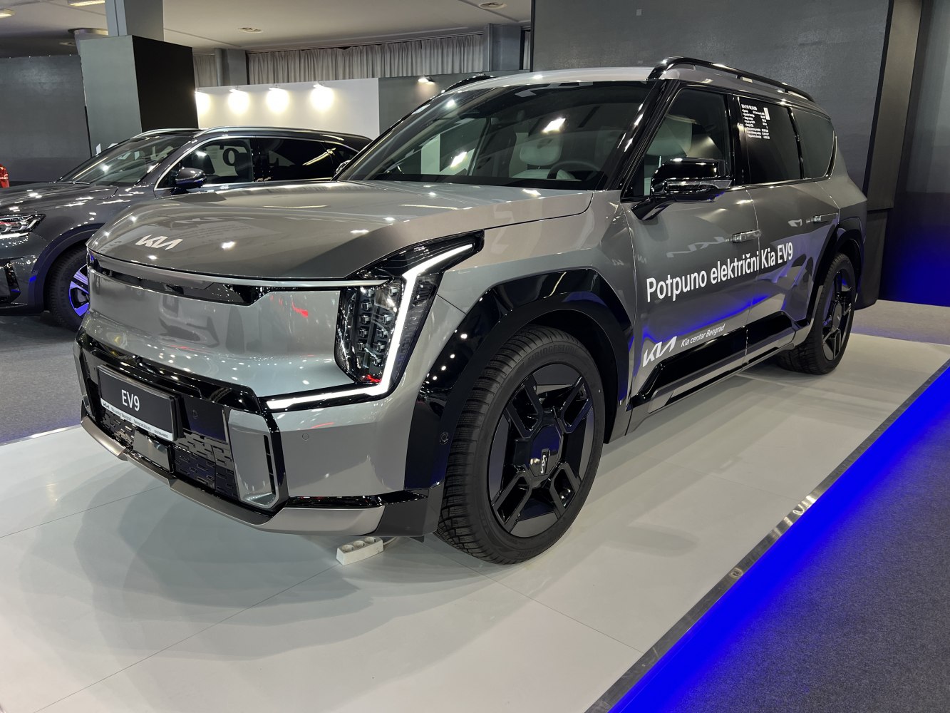 Electric SUV with sharp LED headlights and distinctive aerodynamic wheels