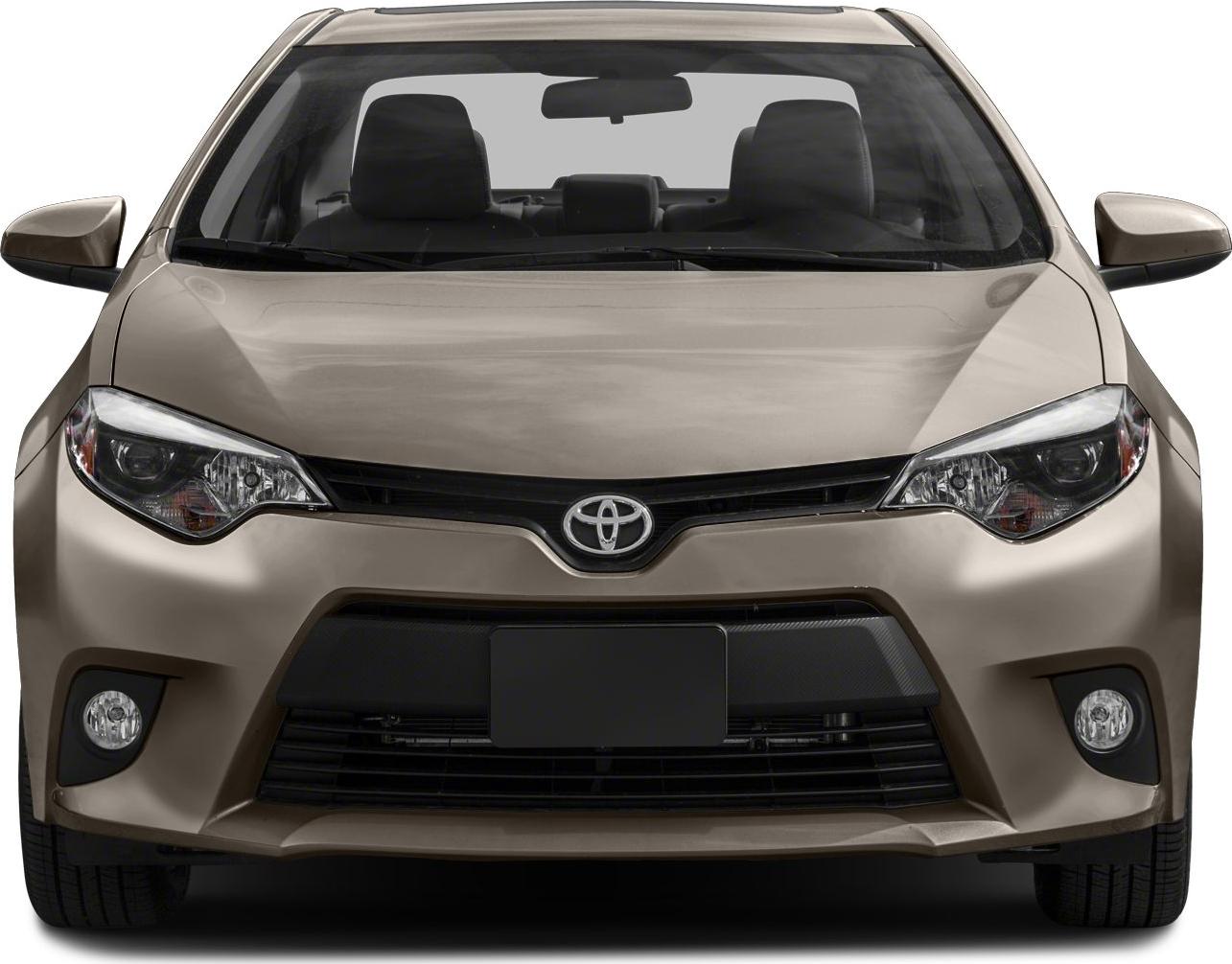 Front view with distinctive headlights, grille, and fog lamps in beige