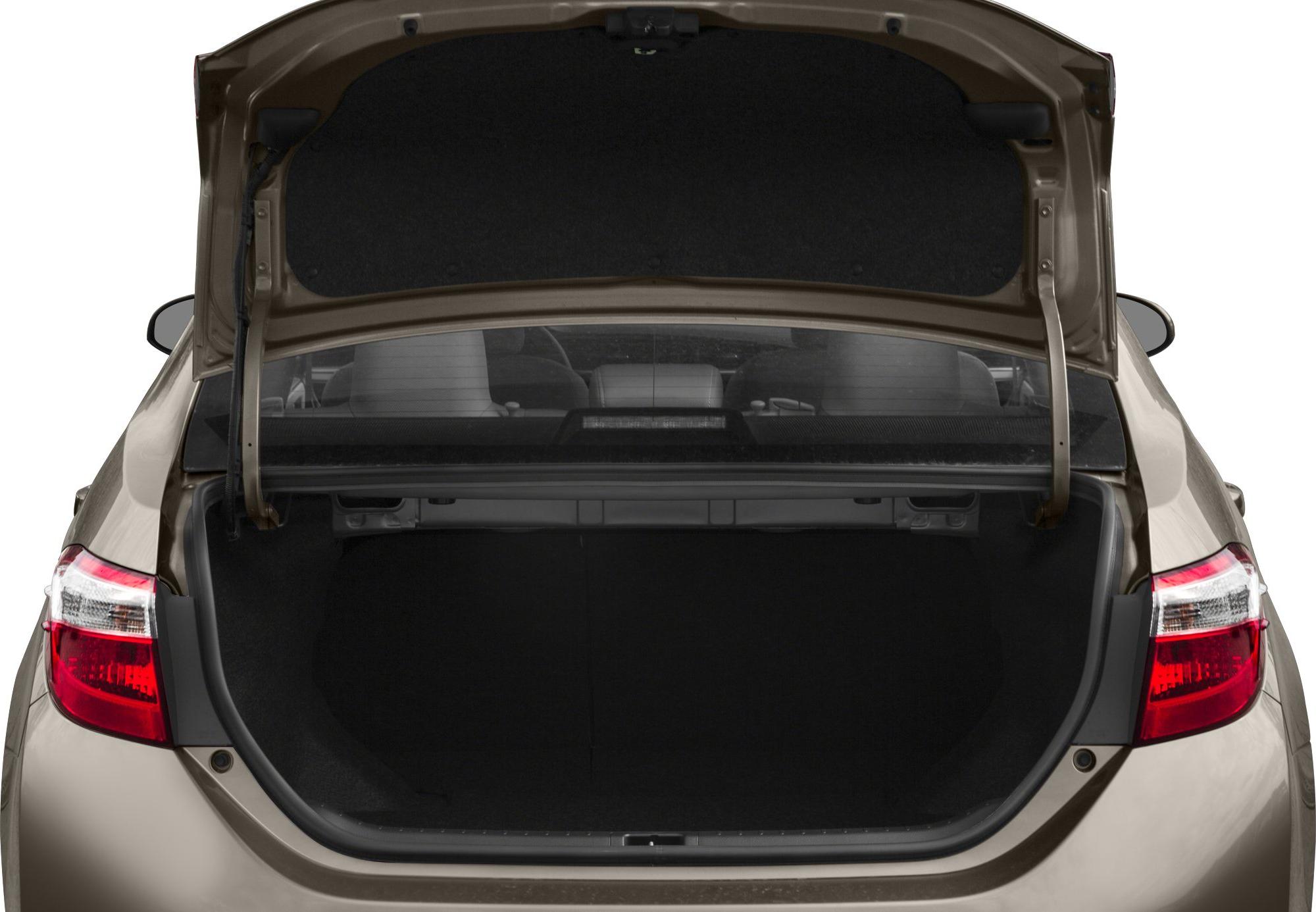 Open sedan trunk with visible rear seats and rear lights