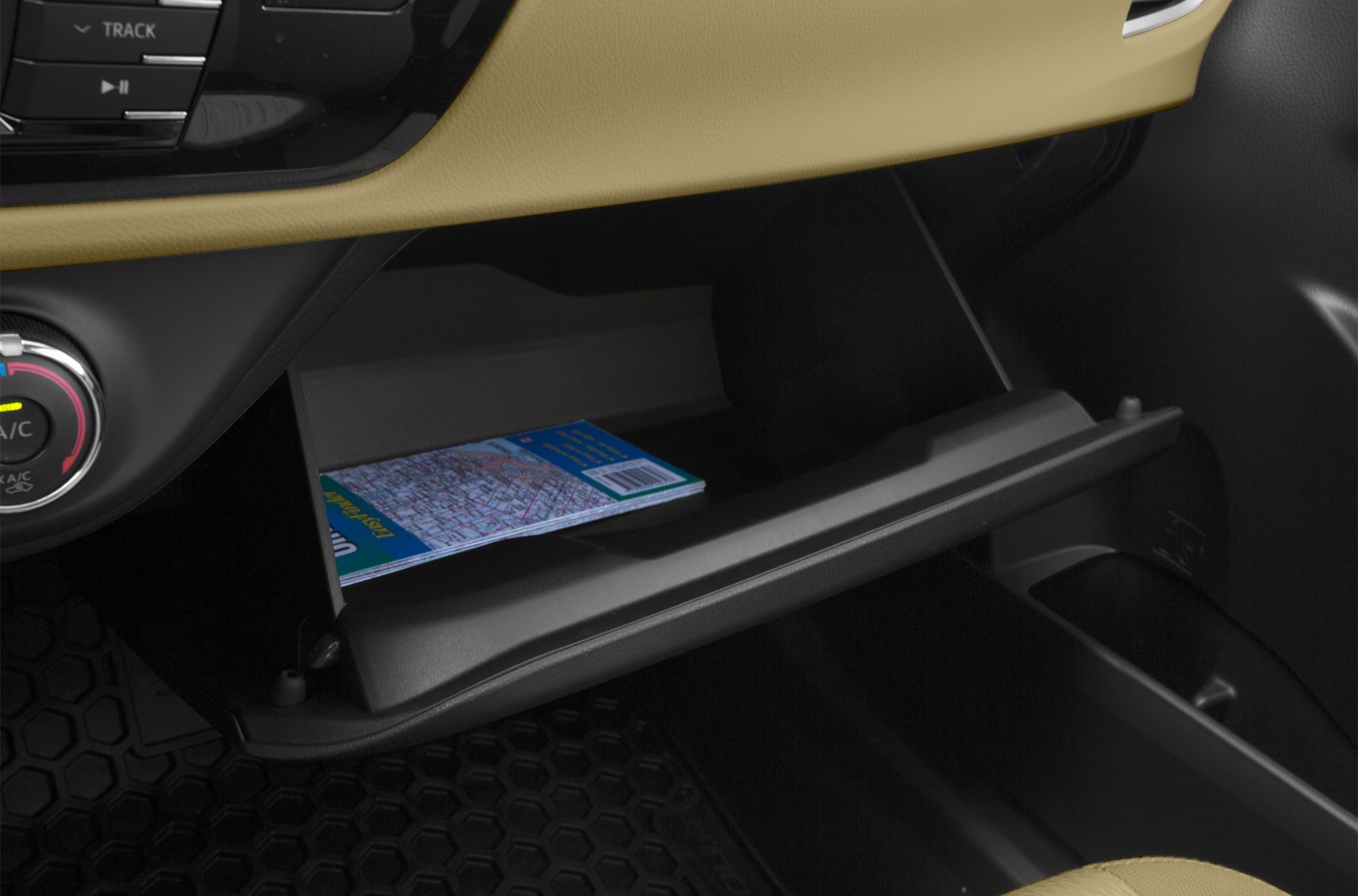 Glove box storage compartment with folded map inside