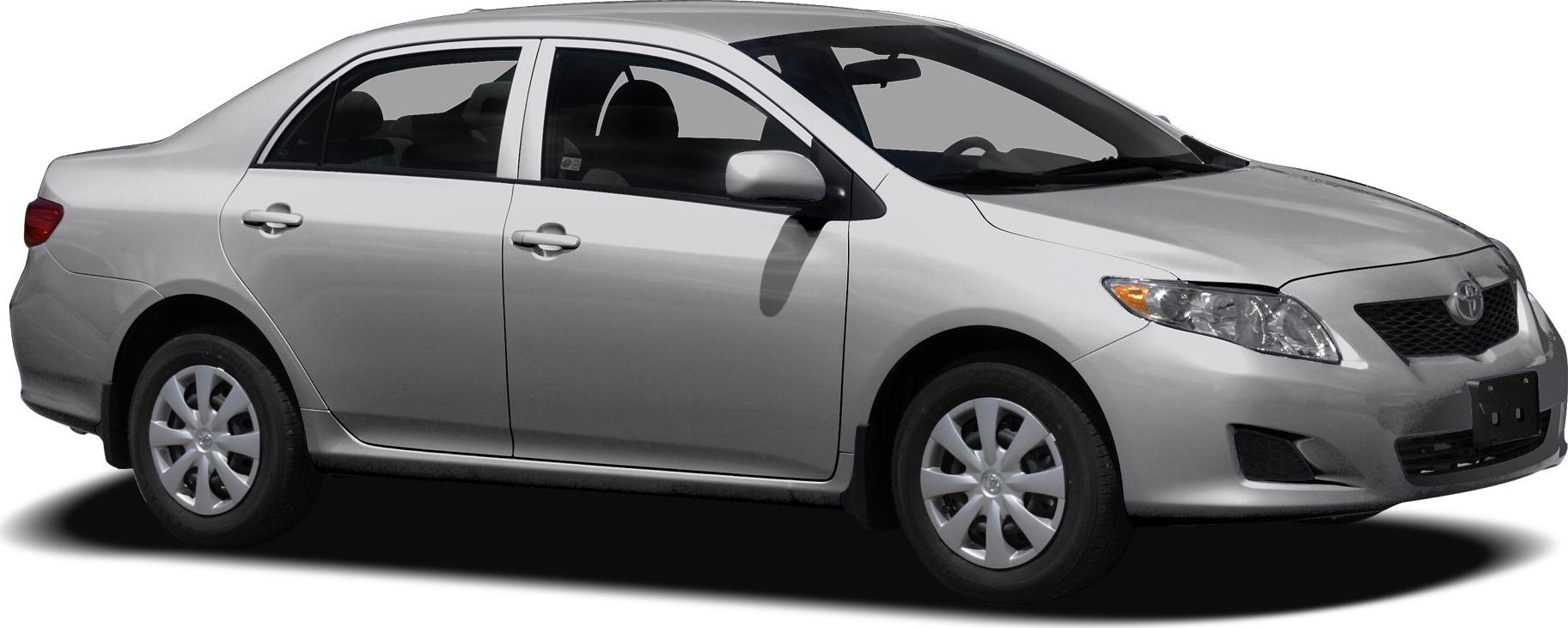 Silver four-door sedan with standard wheel covers and side profile view