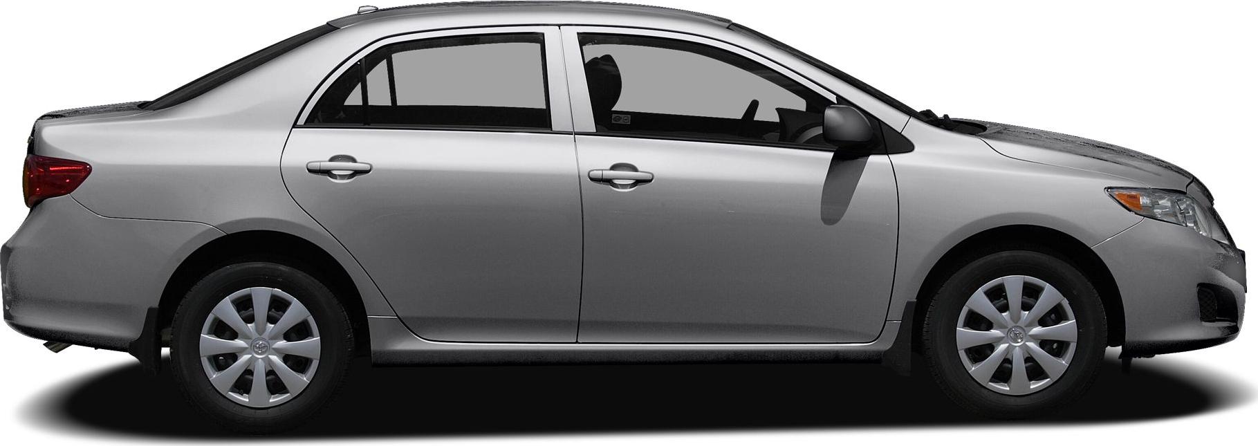 Side view of a silver 4-door sedan with hubcap wheels and sleek windows