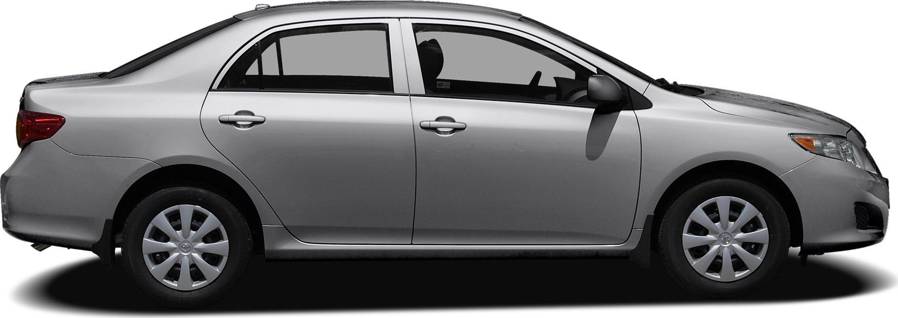 Side profile of a sedan with classic wheel covers and four doors