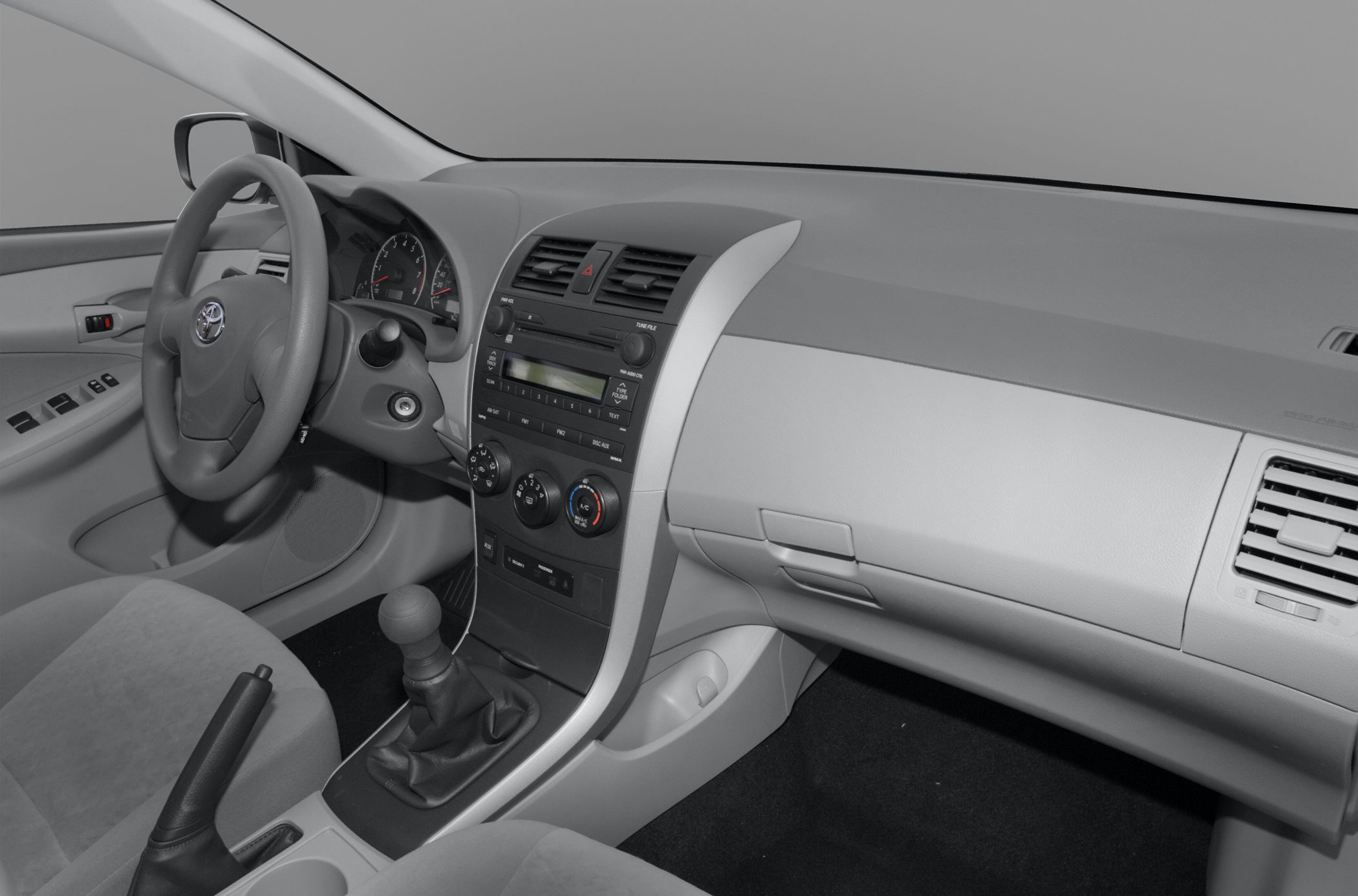 Dashboard with center console and manual transmission gear shift