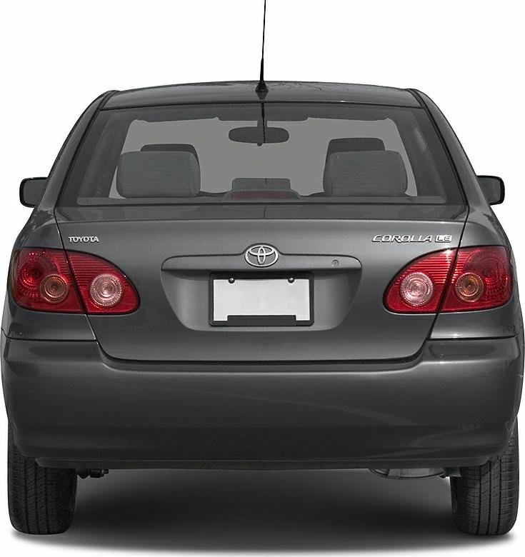 Rear view of gray hatchback with tail lights and Toyota emblem
