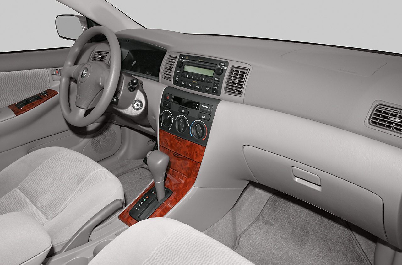 Dashboard and center console with wood trim and automatic transmission