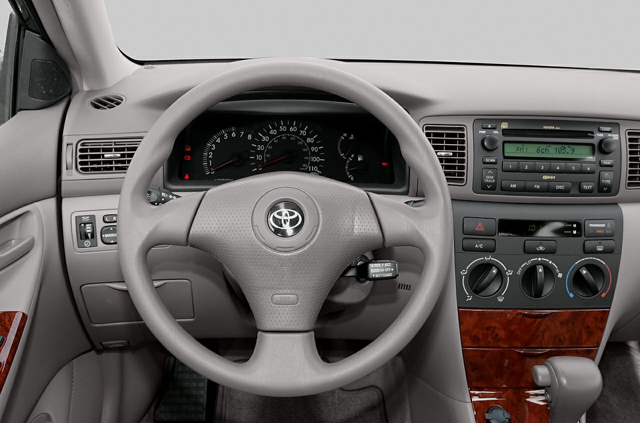 Dashboard and steering wheel with center console controls