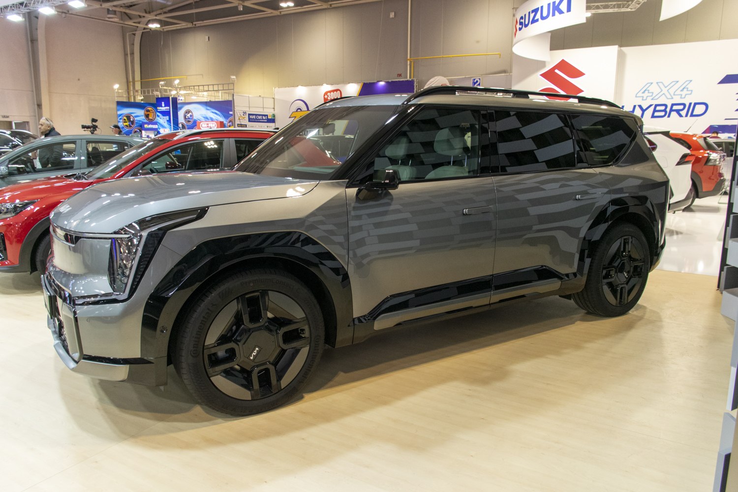 Electric SUV with full LED headlights and black multi-spoke alloy wheels