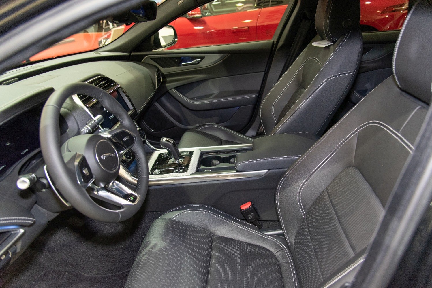 Plush leather seating and sophisticated dashboard with modern controls