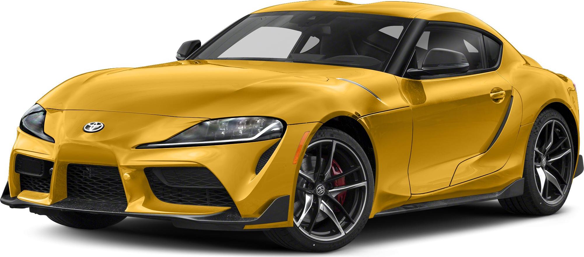 Front left view of a yellow sports coupe with sleek headlights and sporty wheels