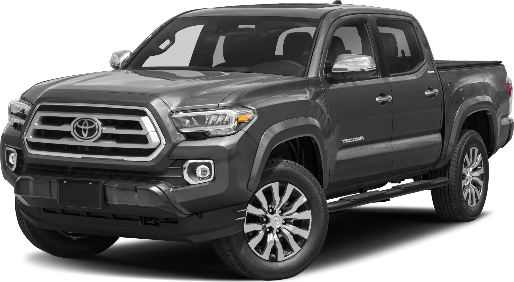 Front side view of black pickup truck with distinctive grille and running boards.
