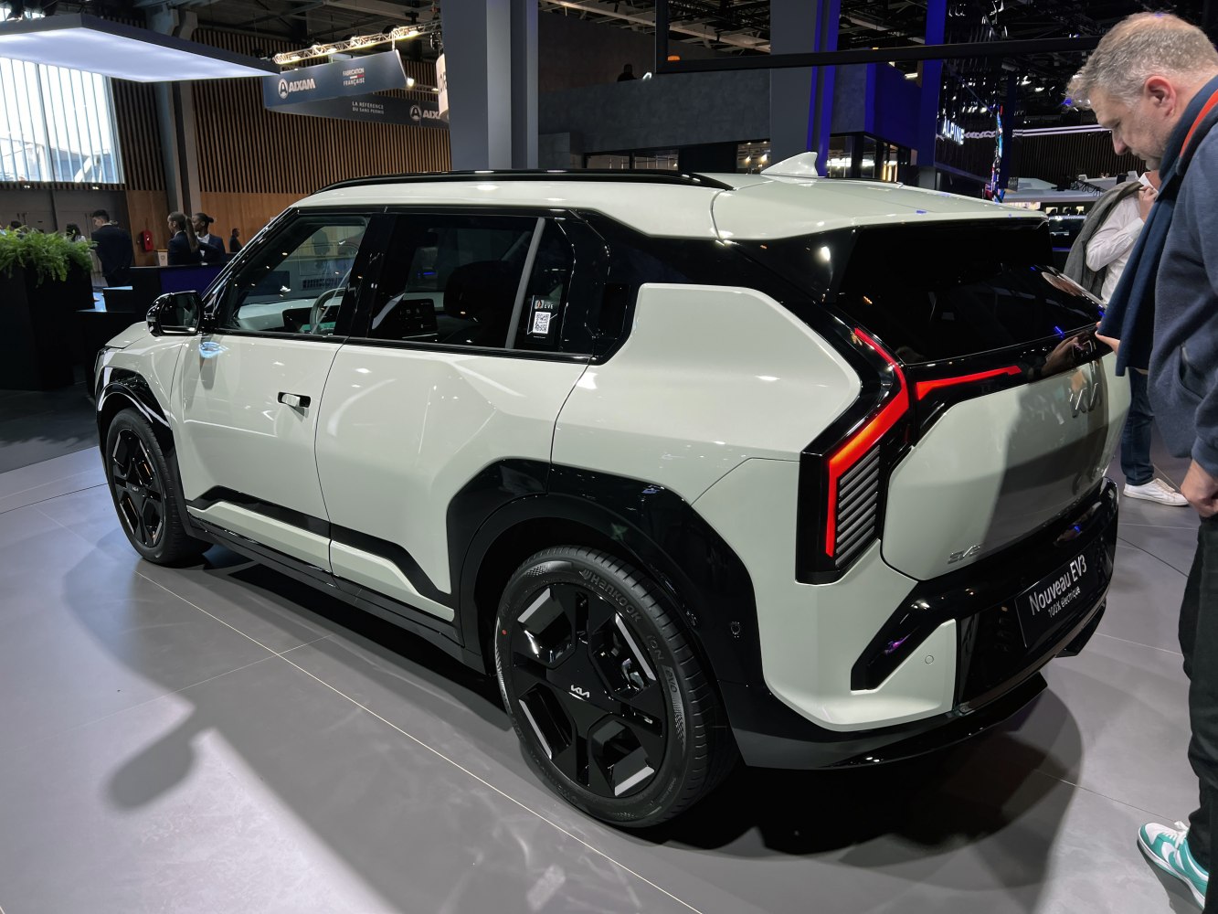 Rear and side view of modern electric SUV with LED tail lights