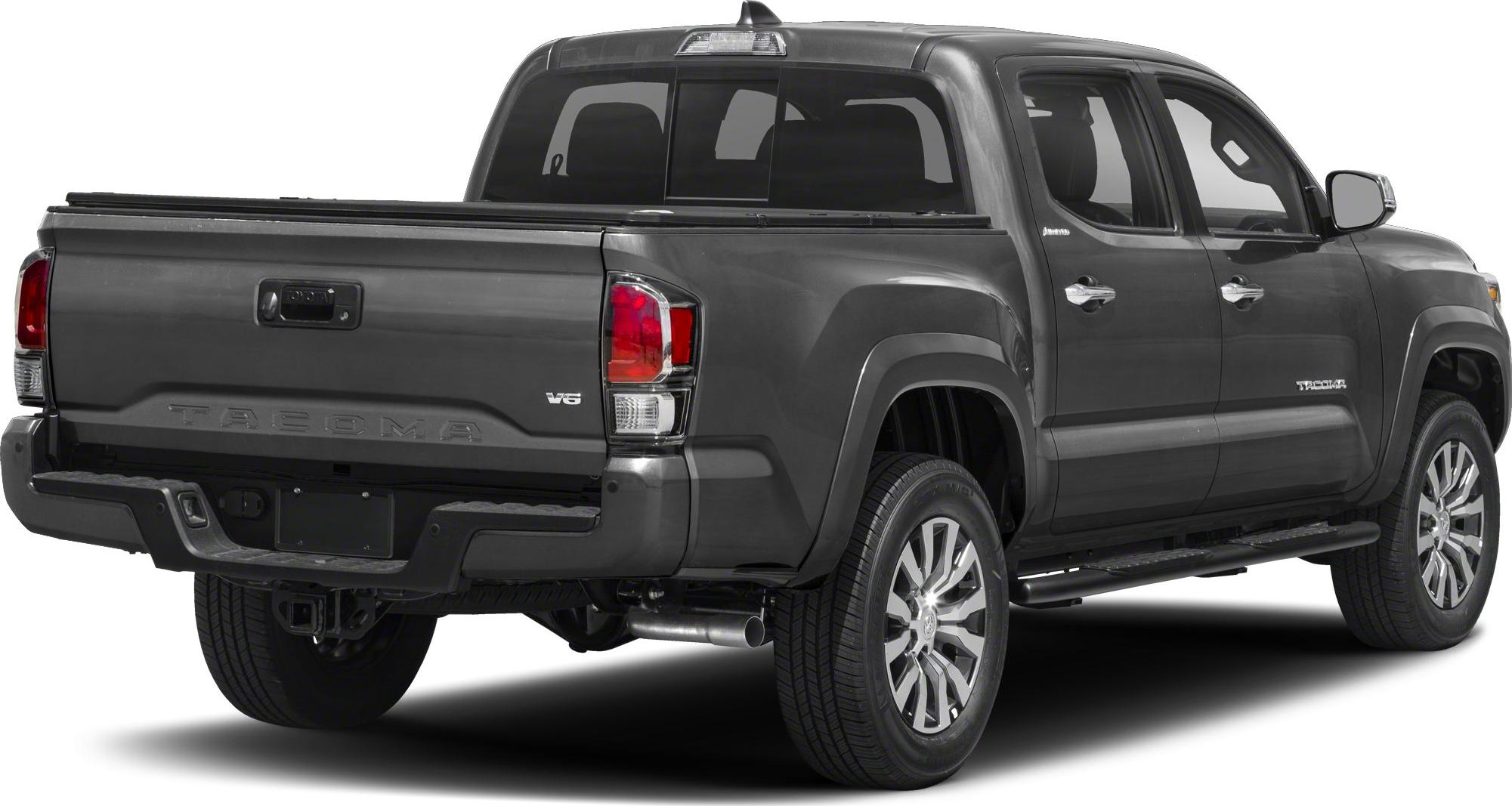 Rear and side view of pickup truck with V6 badge and large alloy wheels