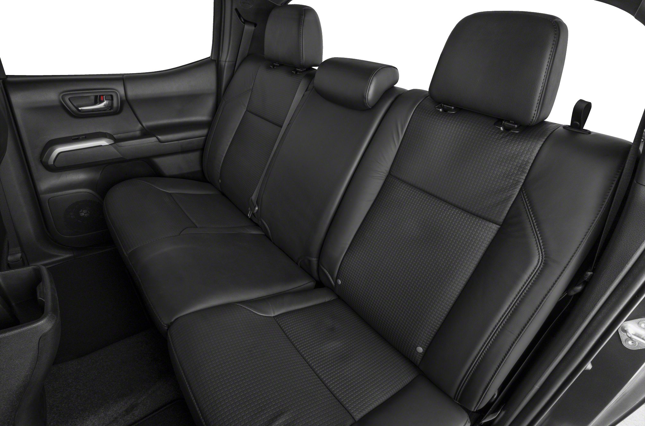 Rear black leather seats with headrests and detailed stitching