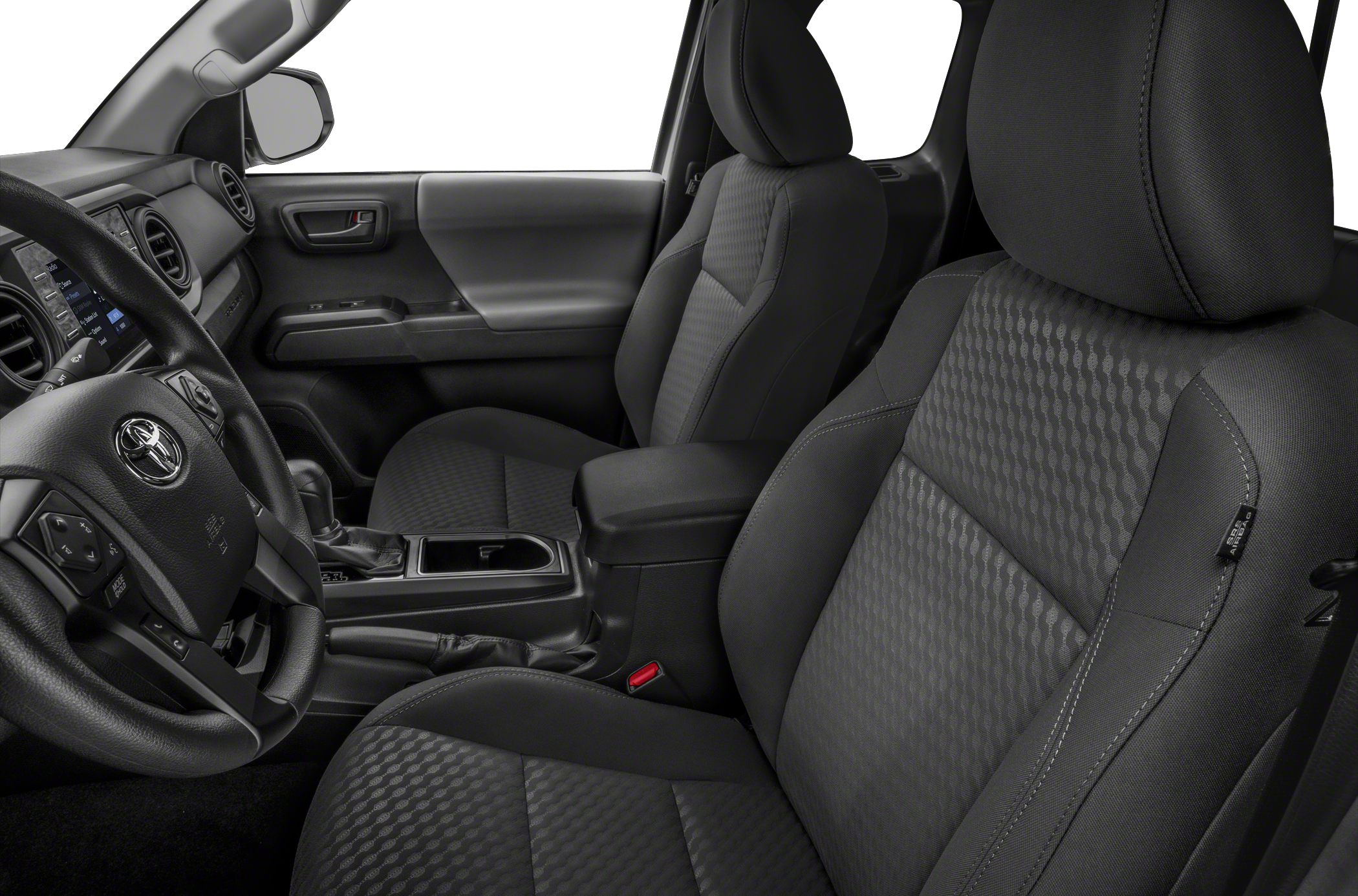 Front seats and steering wheel of a vehicle interior