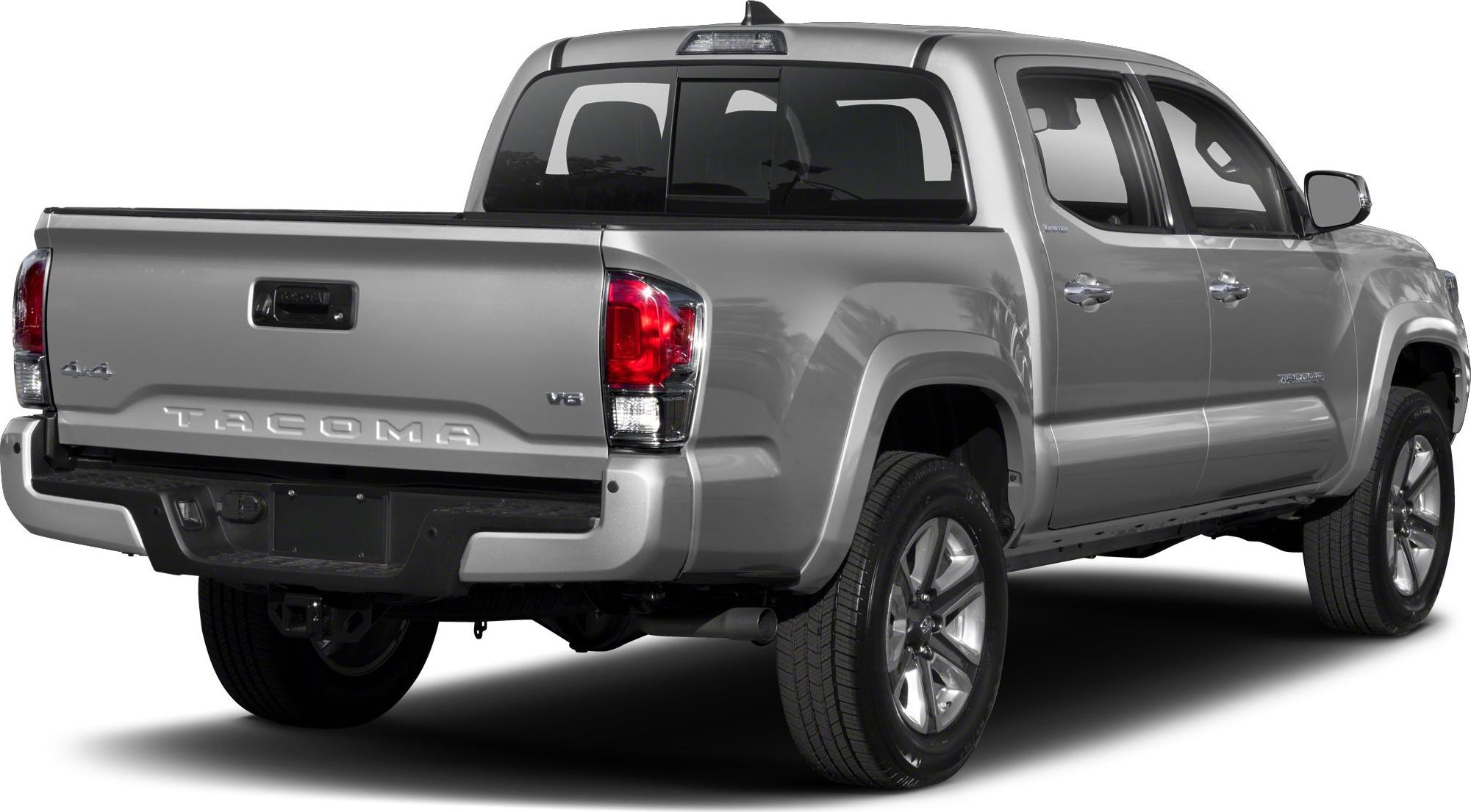 Rear and side view of a 4x4 double cab pickup truck with tailgate.