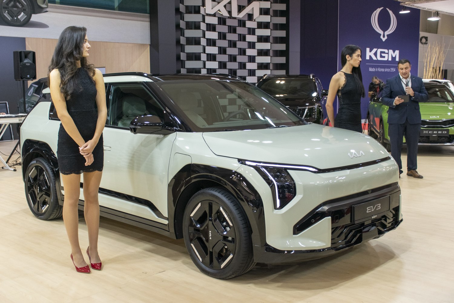 Angular headlights and two-tone styling of electric SUV front and side view