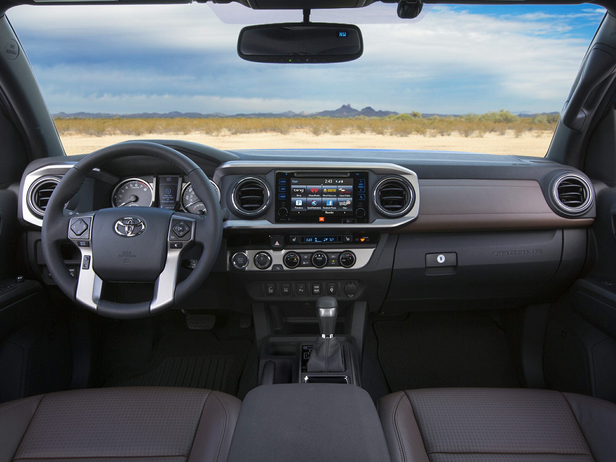 Dashboard and steering wheel with infotainment system in truck interior