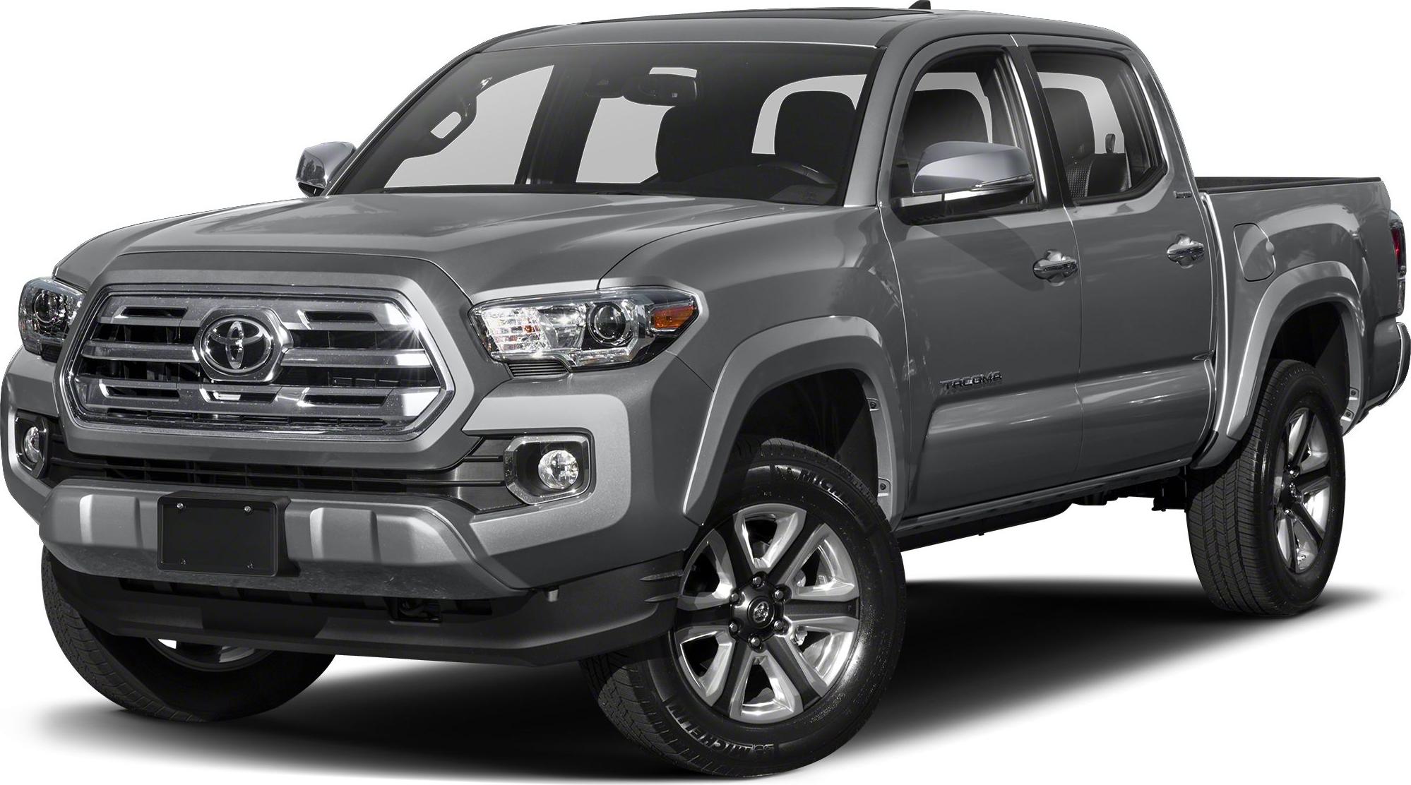 Front grille and double cab mid-size pickup close-up