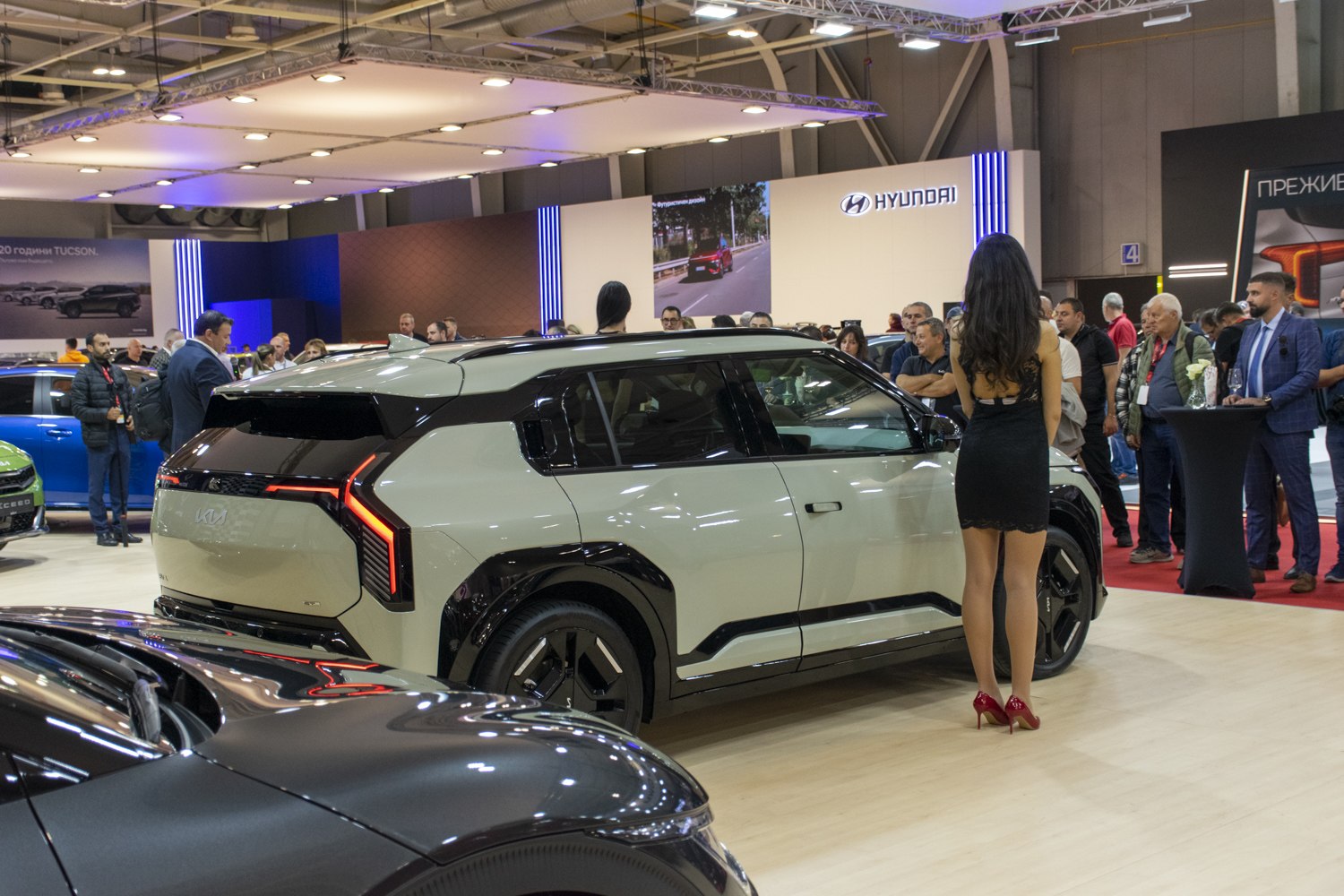 Rear view of electric SUV with LED tail lights and sleek compact design