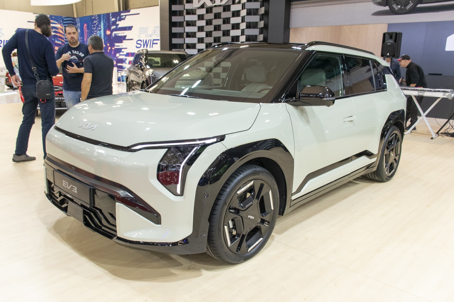 Electric SUV with distinctive front LED lights and black wheel arches